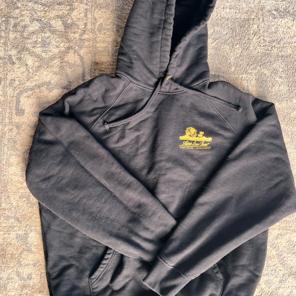 Aime Leon Dore Black Hoodie with Yellow Graphic